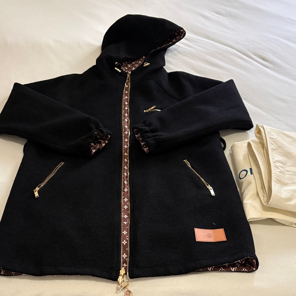 Black Hooded Jacket with Gold Accents